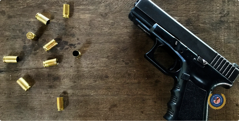 pistol and casings